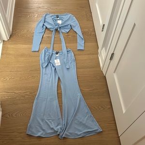 Baby blue Camille Costek Swim collection two piece set.
